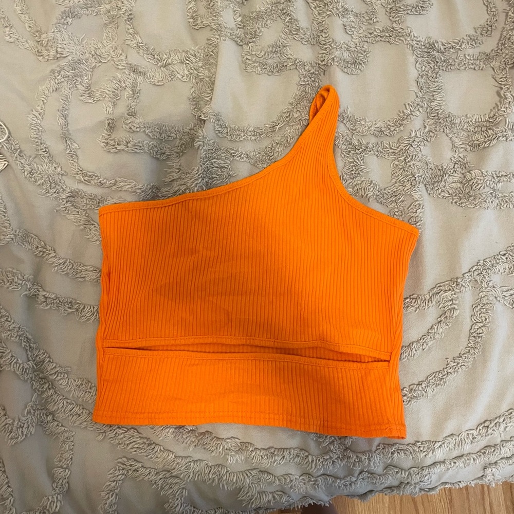 Orange one shoulder cutout going out top